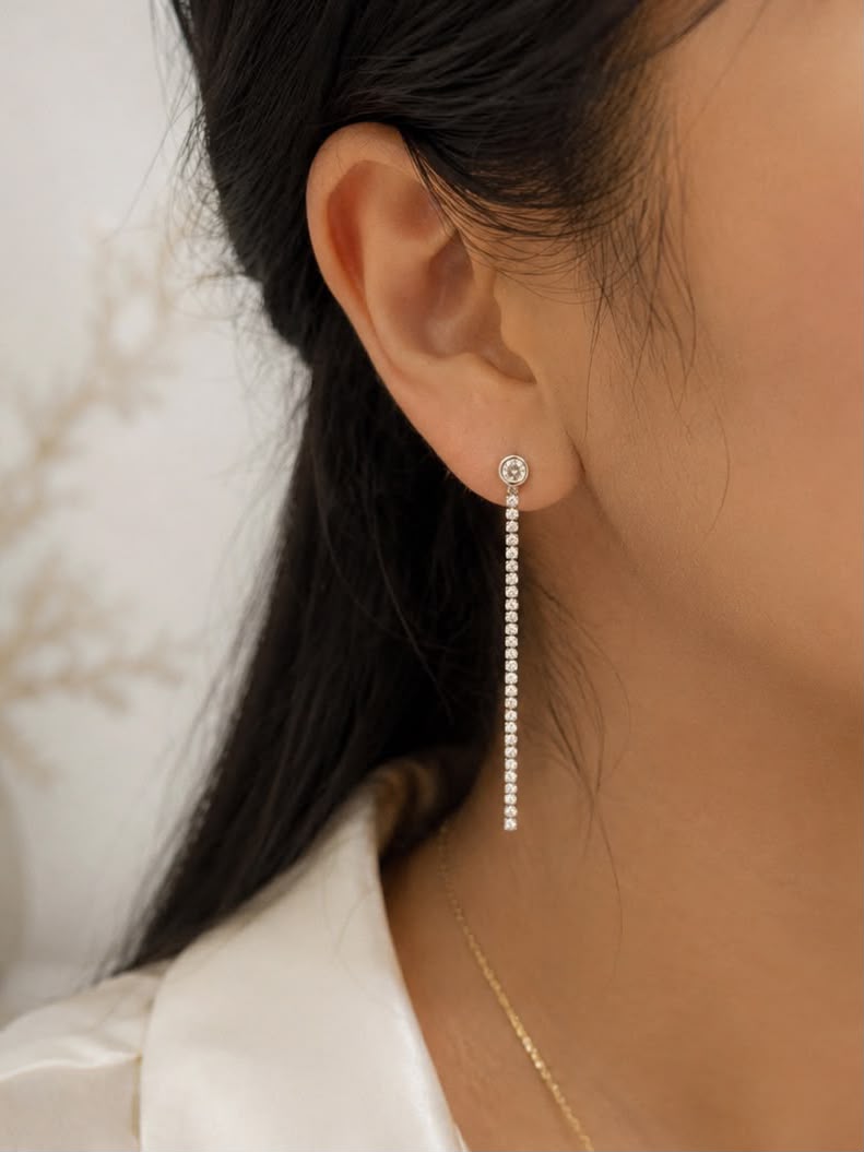 Arete tira circón